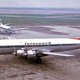 A DC-7 of Internord Airlines passes a Vickers Viscount parked at Liverpool Airport (Ken Fielding)
